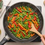 Comment réussir une cuisson uniforme des légumes surgelés à la poêle sans les rendre mous